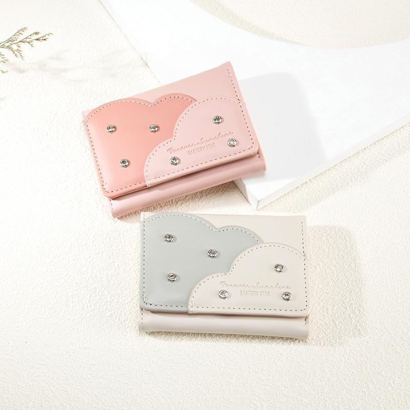 

New short wallet, large capacity, multi-card position, simple rivet, three-fold change bag for students and women фіолетовий