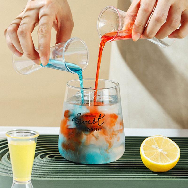 

Double-Ended Small Measuring Cup With Scale Device Double-Ended Measuring Cup