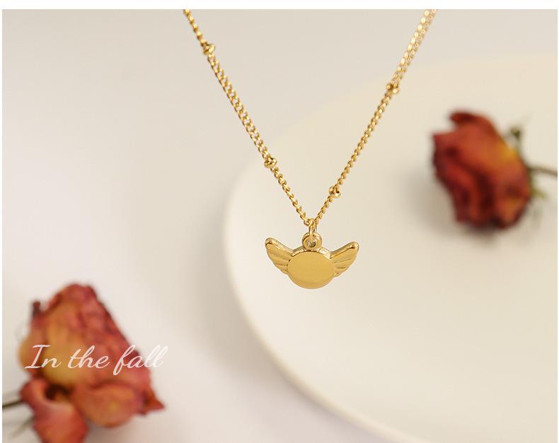 Gold-Plated Geometric Wing Pendant Necklace: Japanese-Korean Design with Titanium Steel Clavicle Chain