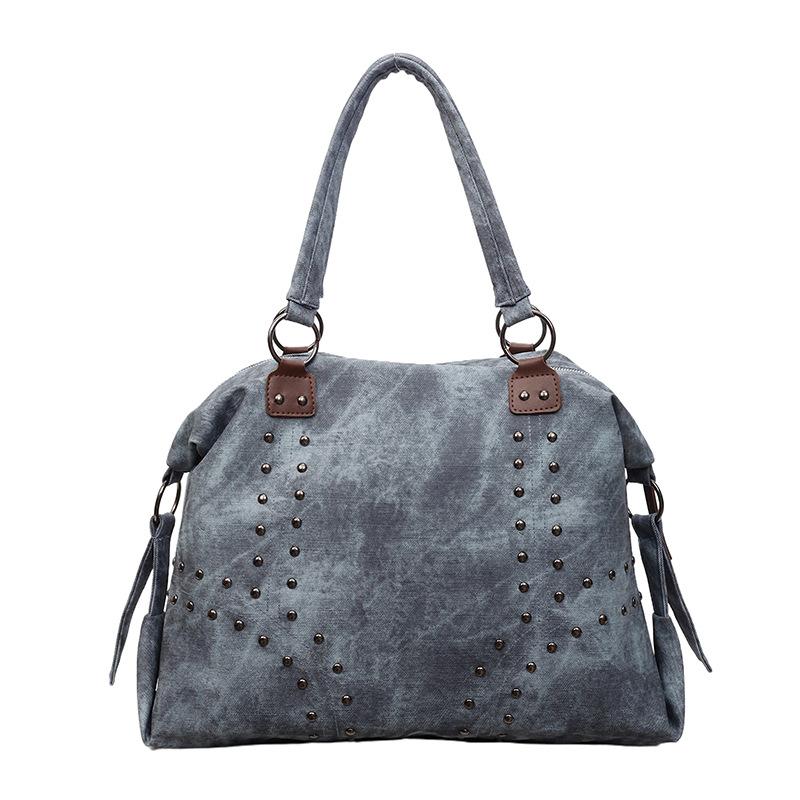The Large-capacity Rivet Commuter Tote Bag Is A Popular, Casual and Versatile Single-shoulder Underarm Women's Bag