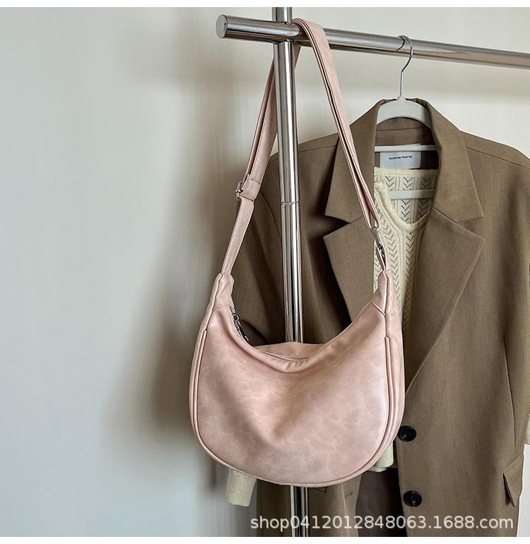 

Korean version of soft leather dumpling bag 2025 new texture large capacity simple solid color shoulder messenger bag