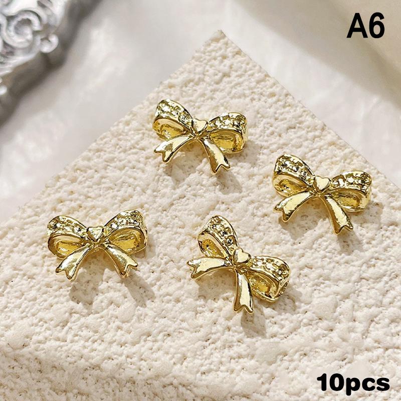 10ks 3D Butterfly Alloy nail Charms Designové šperky s motýlkem Luxusní zlaté stříbrné duté nail art dekorace příslušenství