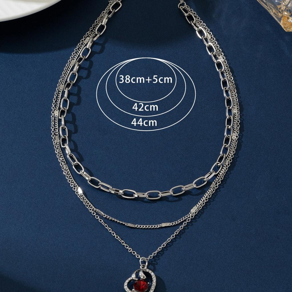 Multi-layer necklace, love hollow inlaid with ruby temperament, high-end autumn and winter layered sweater chain, hot sale