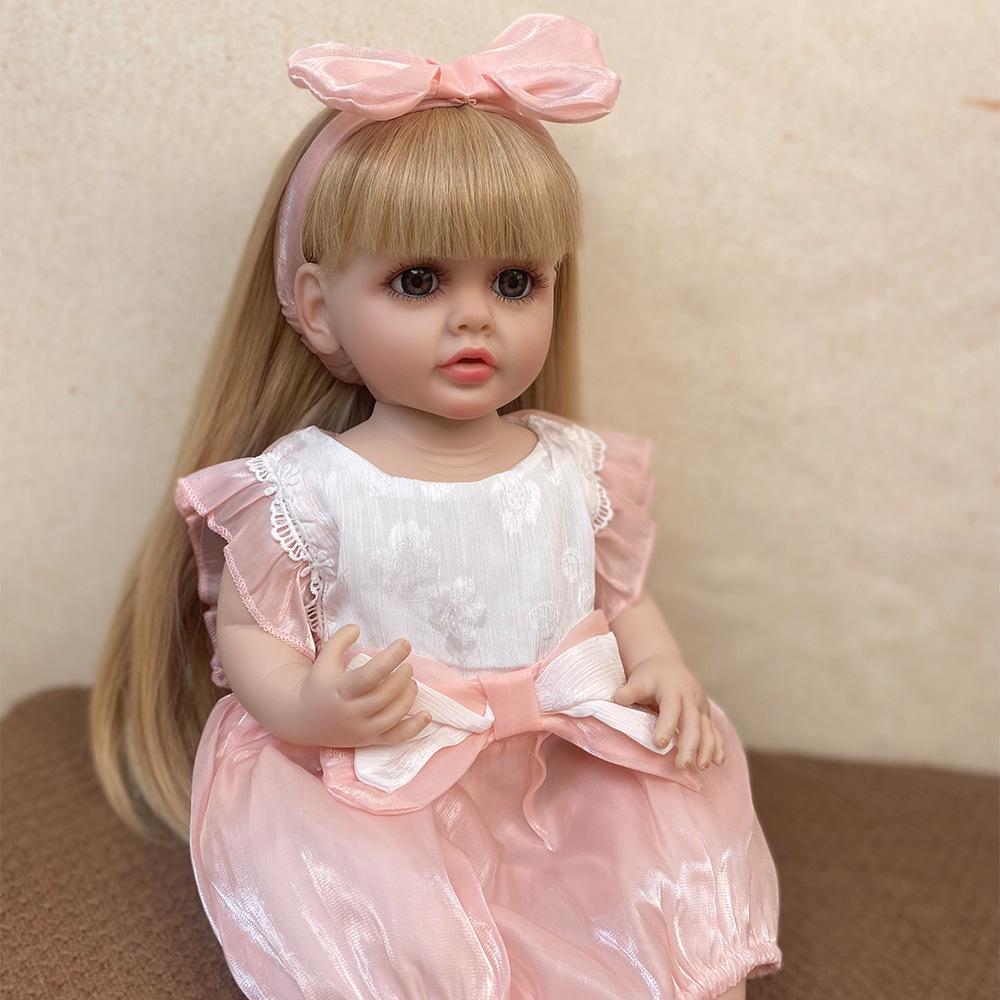 55CM Lalka Reborn z Pełnego Silikonu Można Wkładać do Wody Miła Słodka Betty Lalka Noworodka Wklejane Długie Włosy Lalki Symulacyjne dla Dzieci Prezent na Urodziny Boże Narodzenie