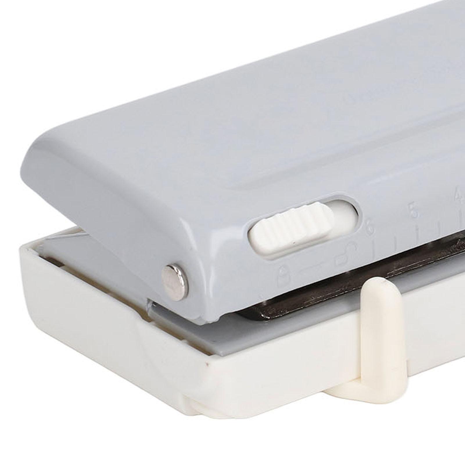 

Дырокол на 6 отверстий, вместимость 10 листов, регулируемое межосевое расстояние, серый дырокол для рыхлой бумаги с позиционирующей линейкой