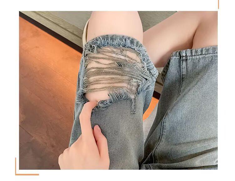 Damen Nostalgische Blaue High-Waist Ripped Denim Shorts - Lockere Passform, Mittellang, Weites Bein für Birnenförmige Körper.