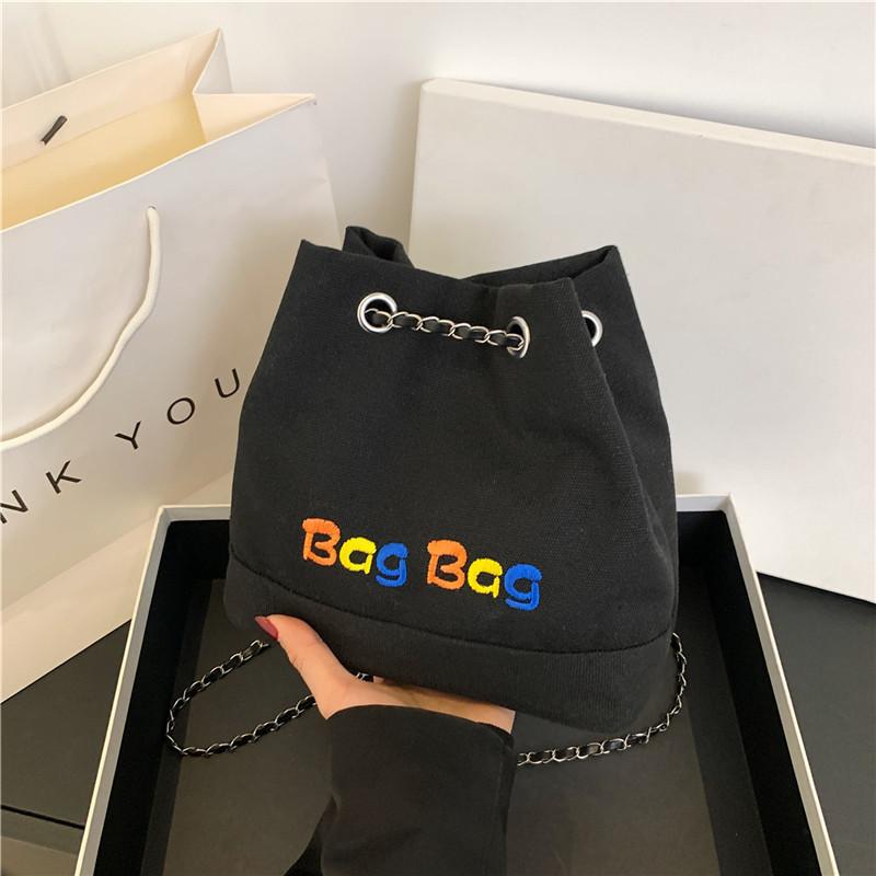 

Embroidered Alphabet Canvas Women s Bag 2024 New Style Street Fashion Chain Bucket Shoulder Crossbody Backpack чёрный