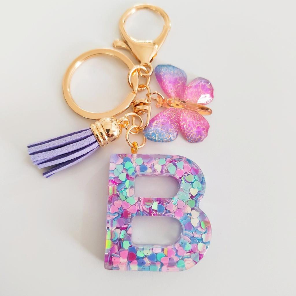 Fashion butterfly fringe initial keychain Drop glue Blend sequin A-Z26 letter keychain Cute Ladies Student Bag Accessory Gift