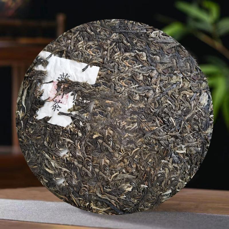 2015 Yunnan Xishuangbanna Ancient Tree Tea Red Seal Banzhang 357g Pu'er Raw Tea