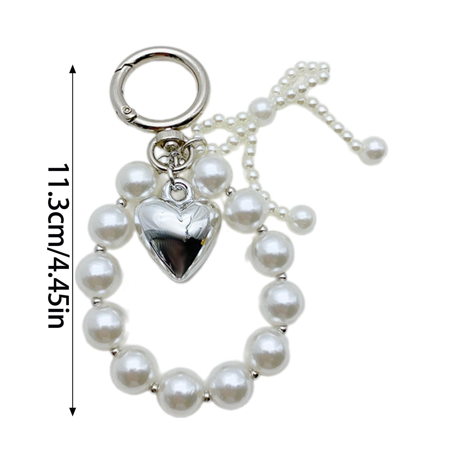 Стильный брелок-бантик с искусственным жемчугом — фото 4