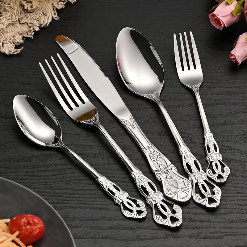 European Style Stainless Steel Cutlery Set with Hollow Relief Design: Royal Knife, Fork, and Spoon.