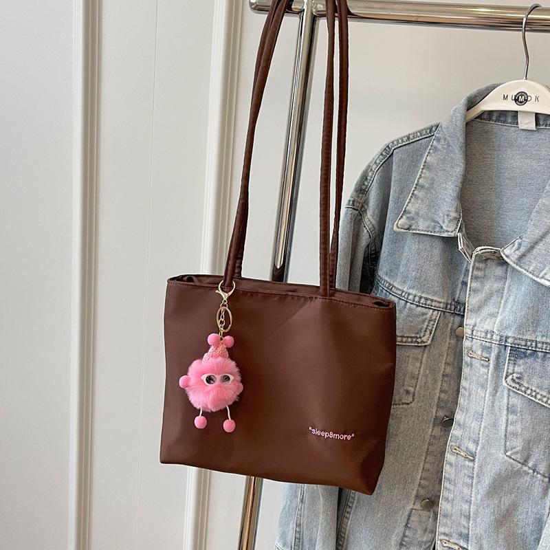 

Simple and fashionable large-capacity bag women s 2024 summer new niche design fashion tote bag casual shoulder bag коричневий