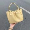 2024 New Soft Leather Cloud Pleated Small Bag Women's Handbag Vegetable Basket Niche High-end Commuter Messenger Bag