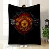 A Red and Gold Manchester United Emblem Revealed Through Ripped Black Fabric. for All Seasons Blanket Lunch Break Throw Gift