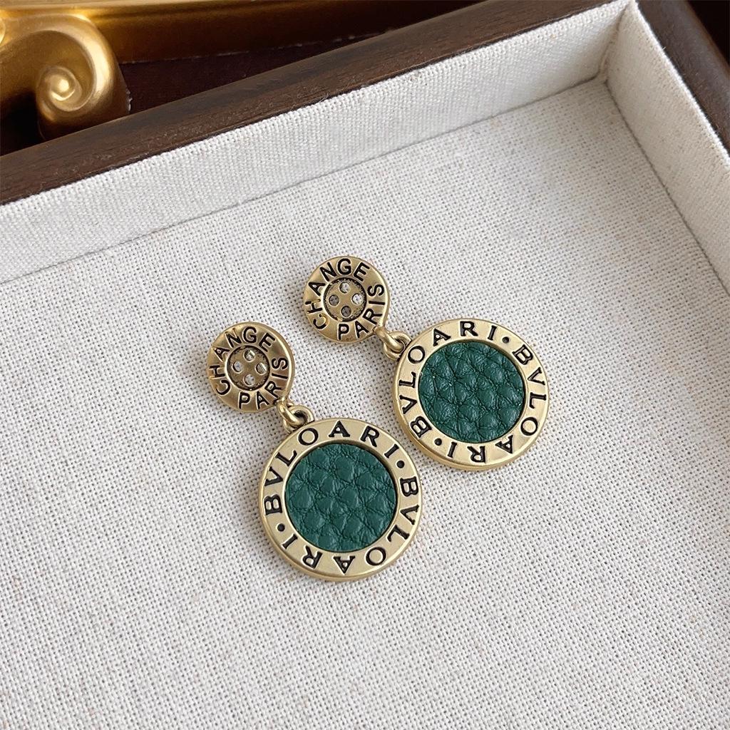 Boucles d'oreilles géométriques vintage en perles pour femmes - Style rétro de Hong Kong, luxe léger, sensation haut de gamme