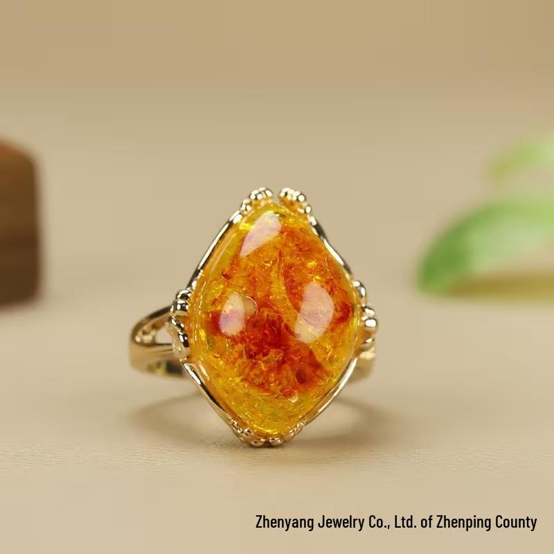 Anillo unisex ajustable de ámbar en amarillo miel con detalles en oro rosa