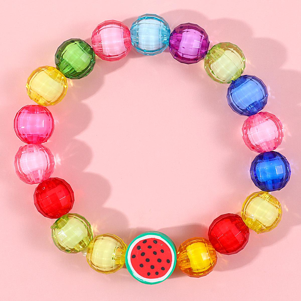 

Детский комплект из цветочного ожерелья и браслета – цветные акриловые бусины