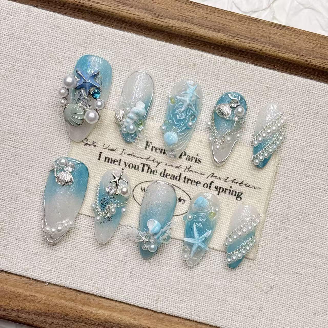 Blue Ocean Gradient Cat Eye Glitter Almond Nails with 3D Carved Shell