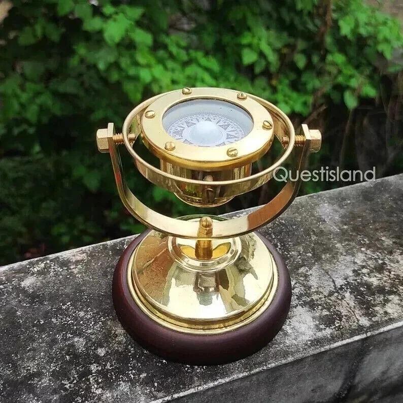 Brass Gimbal Compass with a Wooden Base Is a Wonderful Addition To Any Collecti