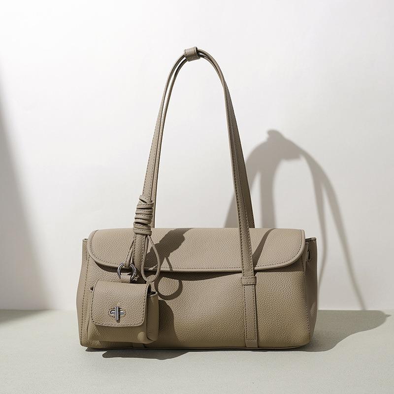 Spring and summer new lychee pattern armpit bag women's commuter versatile baguette bag niche design leather shoulder bag