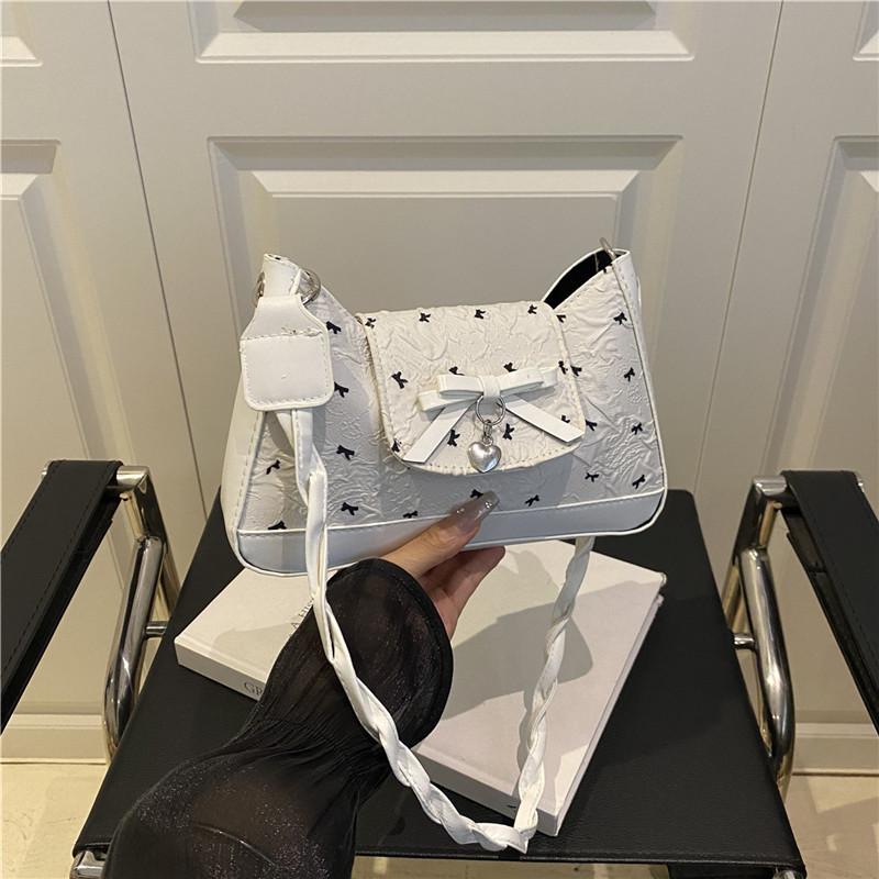 

Niche design bow underarm bag women s 2025 new handbag fashion shoulder messenger bag sweet baguette bag