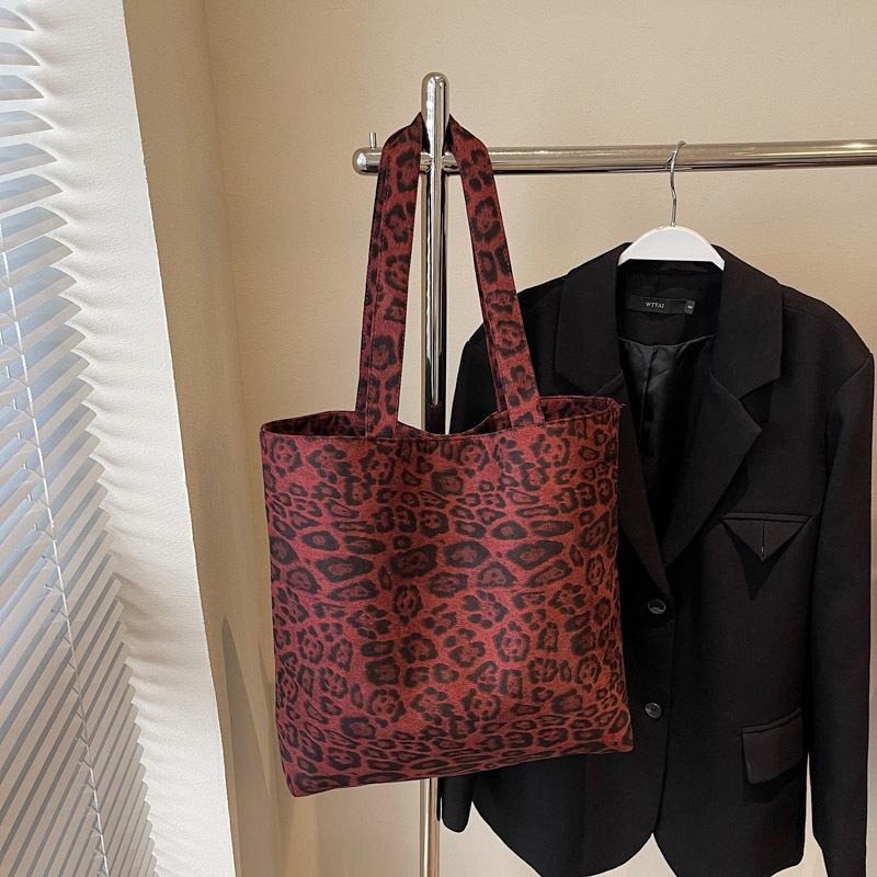 Leopard print canvas commuting lazy wind bag women 2025 casual fashion portable large capacity shoulder simple bag crossbody