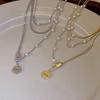 2023 Elegant Pearl Pendant Necklace: Niche Design Sweater Chain for Women