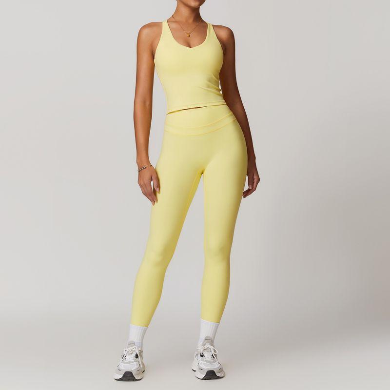 Guangzhou Zechuang Clothing Co., Ltd. Brushed Tight Back Yoga Suit Stretch High Waist Workout Clothes for Women Running