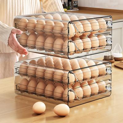 Transparante, ruimtebesparende eierdoos met individuele vakjes en soepel schuivende lade, ideaal voor in de koelkast.