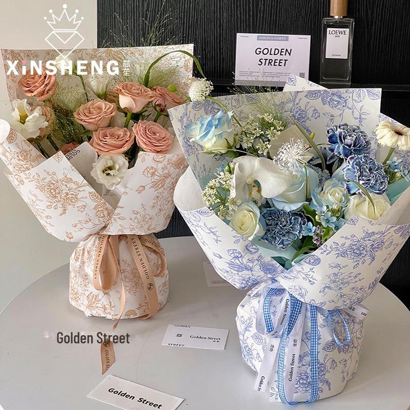 Papier d'emballage imperméable à imprimé floral rétro Xinrui pour bouquets de fleurs