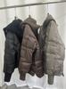 Autumn and Winter New Knitted Hat Splicing Down Jacket Women's Short Loose Fashion White Duck Down Jacket Tide