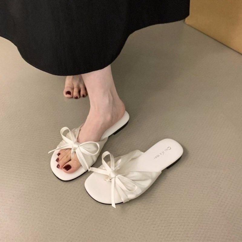 Gentle flat-bottomed bow toe slippers women's summer wear fashion soft-soled one-word holiday sandals