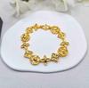Elegant Four-Leaf Clover Gold-Plated Bracelet: High-End Fashion for Men and Women