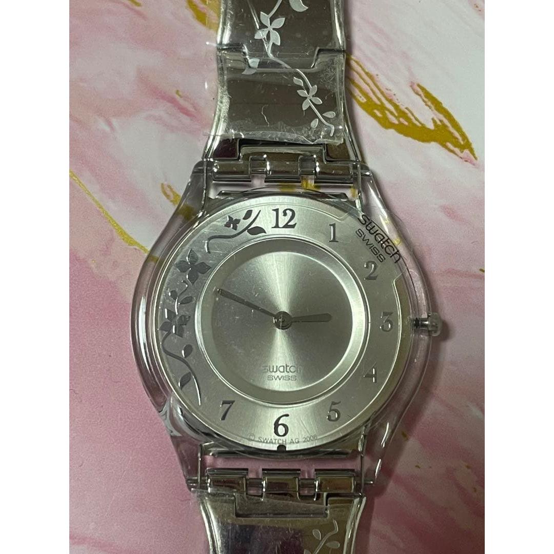 Used Swatch watch body silver floral pattern