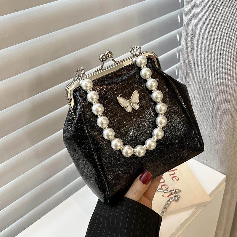 

Bag new 2025 Korean version fashionable retro shoulder bag ins small fragrant wind pearl portable messenger tote bag women чорний