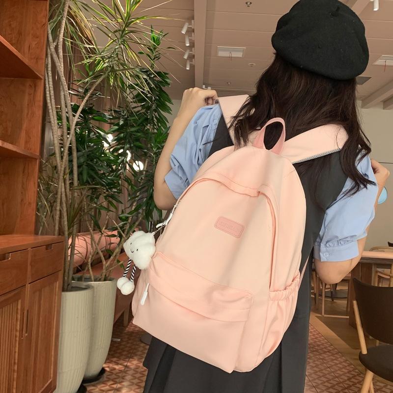Schoolbag Japanese simple backpack large capacity high sense casual backpack male multi-function solid color female college student schoolbag tide