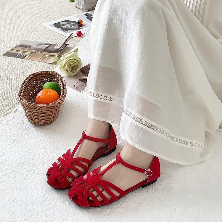 French summer new hollowed-out one-word strap Roman shoes flat-bottomed bag head sandals women's Mori women's niche design hollow