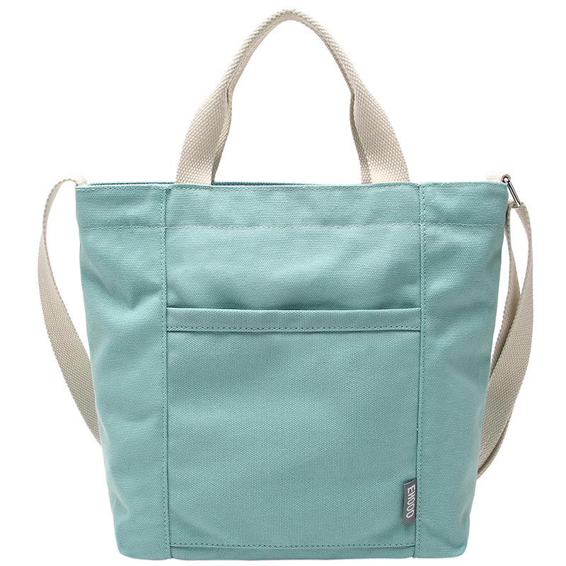 

bag solid color canvas bag women s Korean version simple shoulder bag 2025 new handbag student messenger bag