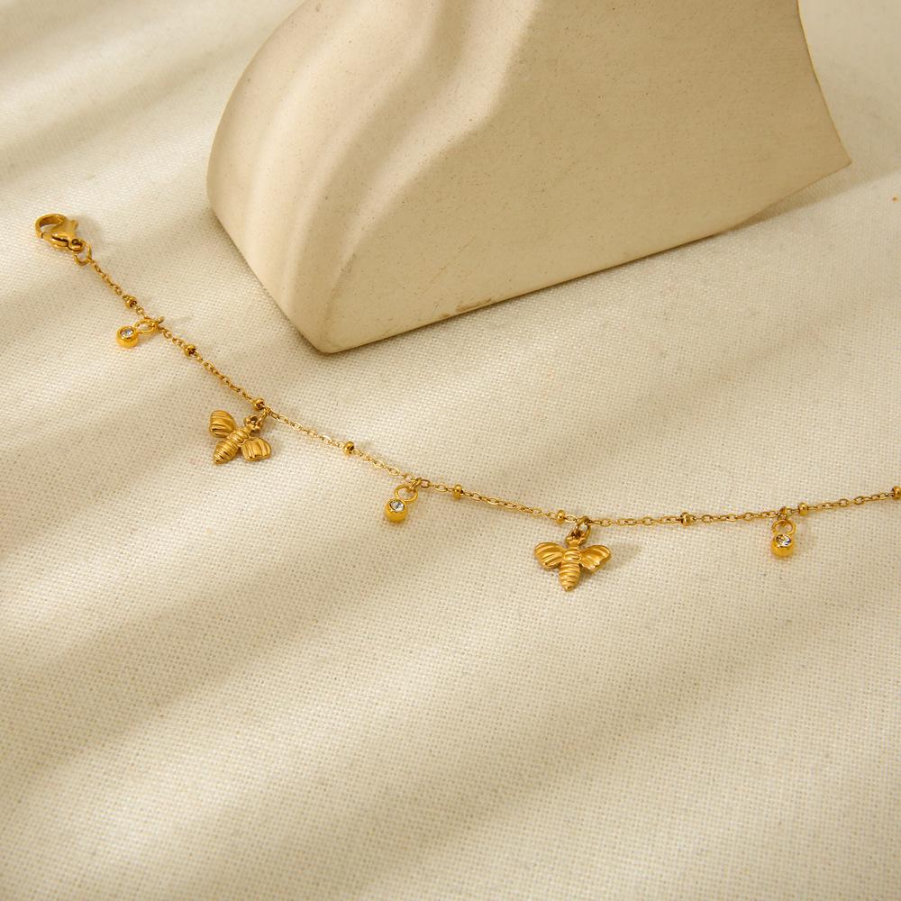 European and American personalized round zircon bee fringed chain plated with 18K gold stainless steel bracelet light luxury versatile hand jewelry