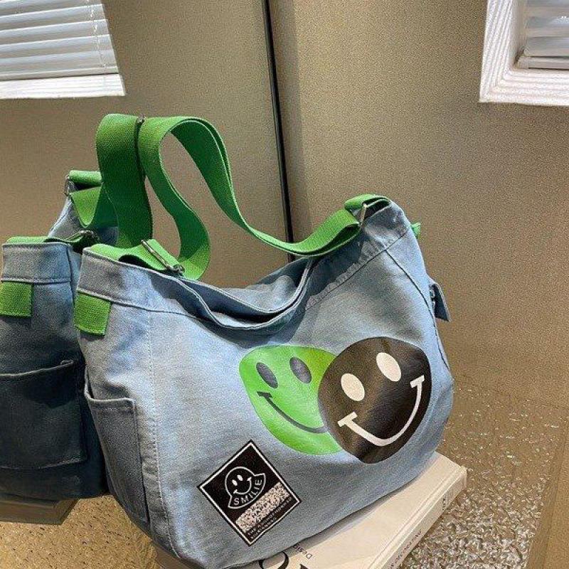 2024 New Korean Style Women's Denim Crossbody Bag: Artistic Smiley Face Canvas with Wide Shoulder Strap