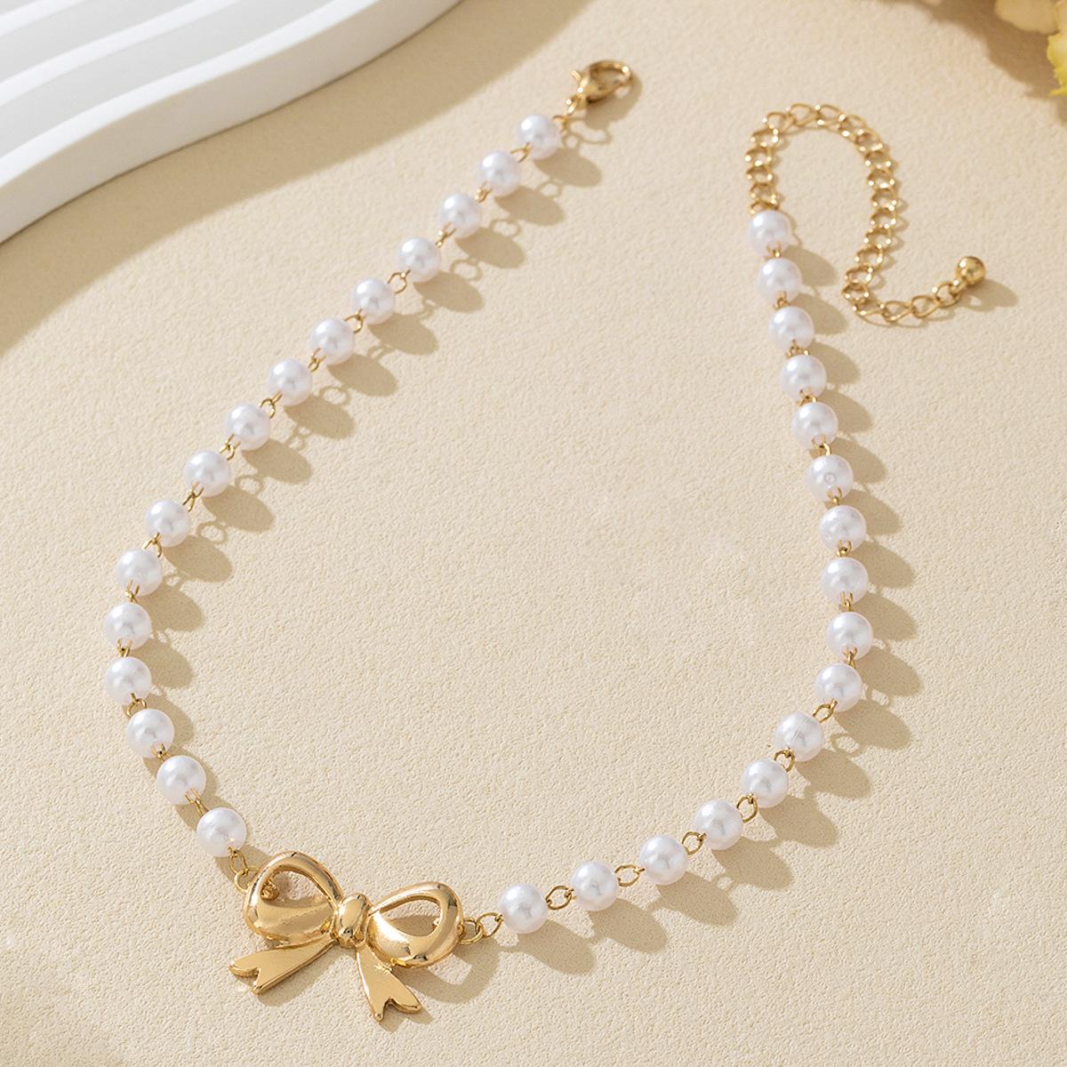 Elegant French Pearl Bow Choker Necklace for Women - Lightweight and Stylish золотой