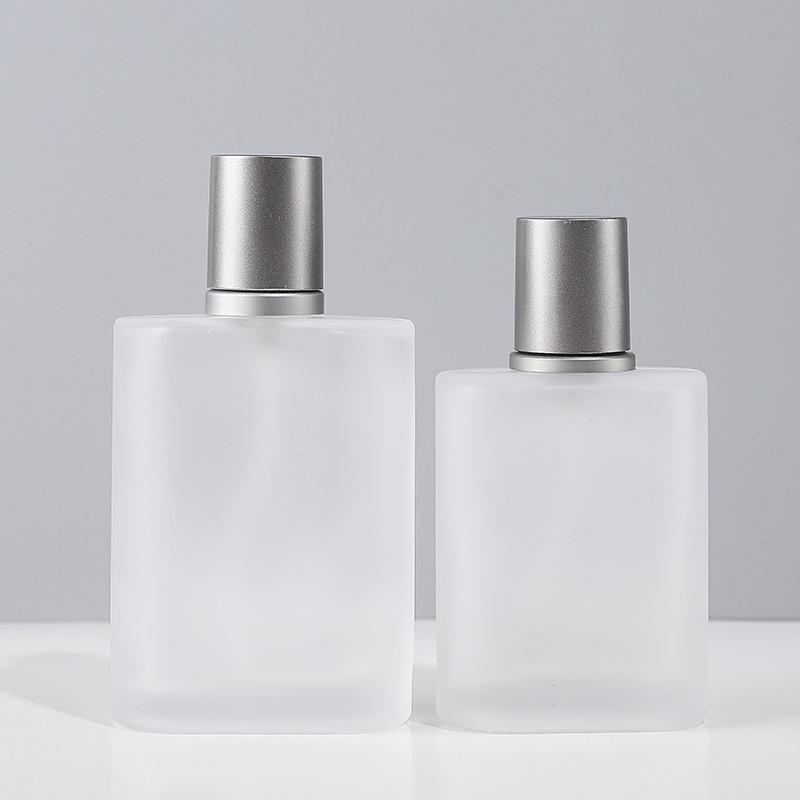 Frosted Glass Perfume Bottles 50ml, Gold & Silver-Gray Caps, Empty Packaging with Screw-top & Spray.