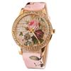 Orologio da polso da donna al quarzo con quadrante rotondo intarsiato di strass a forma di fiore e cinturino in ecopelle