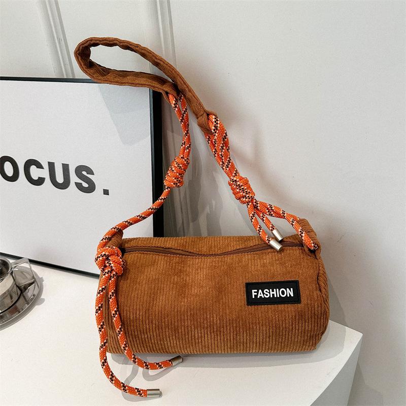 

Solid color spring corduroy messenger bag 2024 niche bag shoulder bag messenger bag fashion casual cylinder backpack коричневий