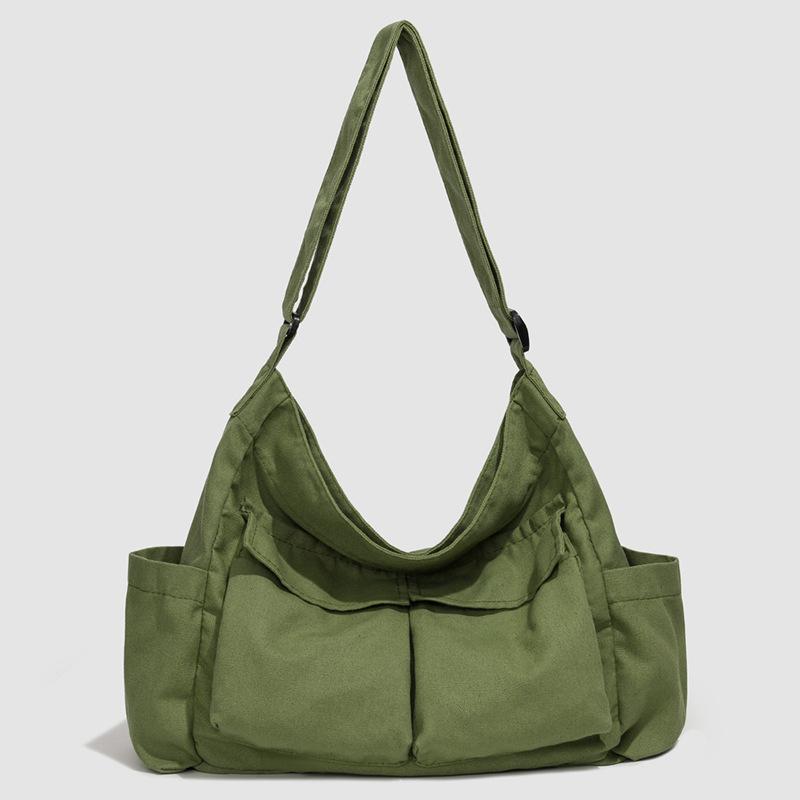 

Literary canvas bag, female casual mailman bag, large-capacity shoulder messenger bag, male student class tote bag зелений