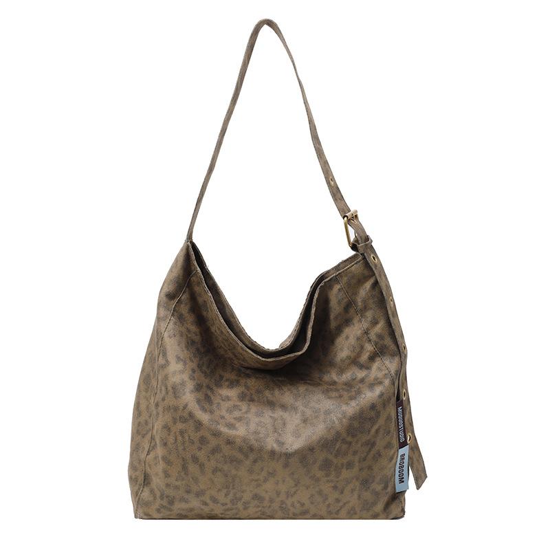 

This year s popular bag leopard print canvas bucket bag 2025 autumn and winter new lazy style retro fashion tote bag