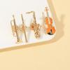 1Pcs Symphony Orchestra Badge Funny Musical Instruments Enamel Brooches Trumpet Clarinet Saxophone Violin Shaped Golden Pins