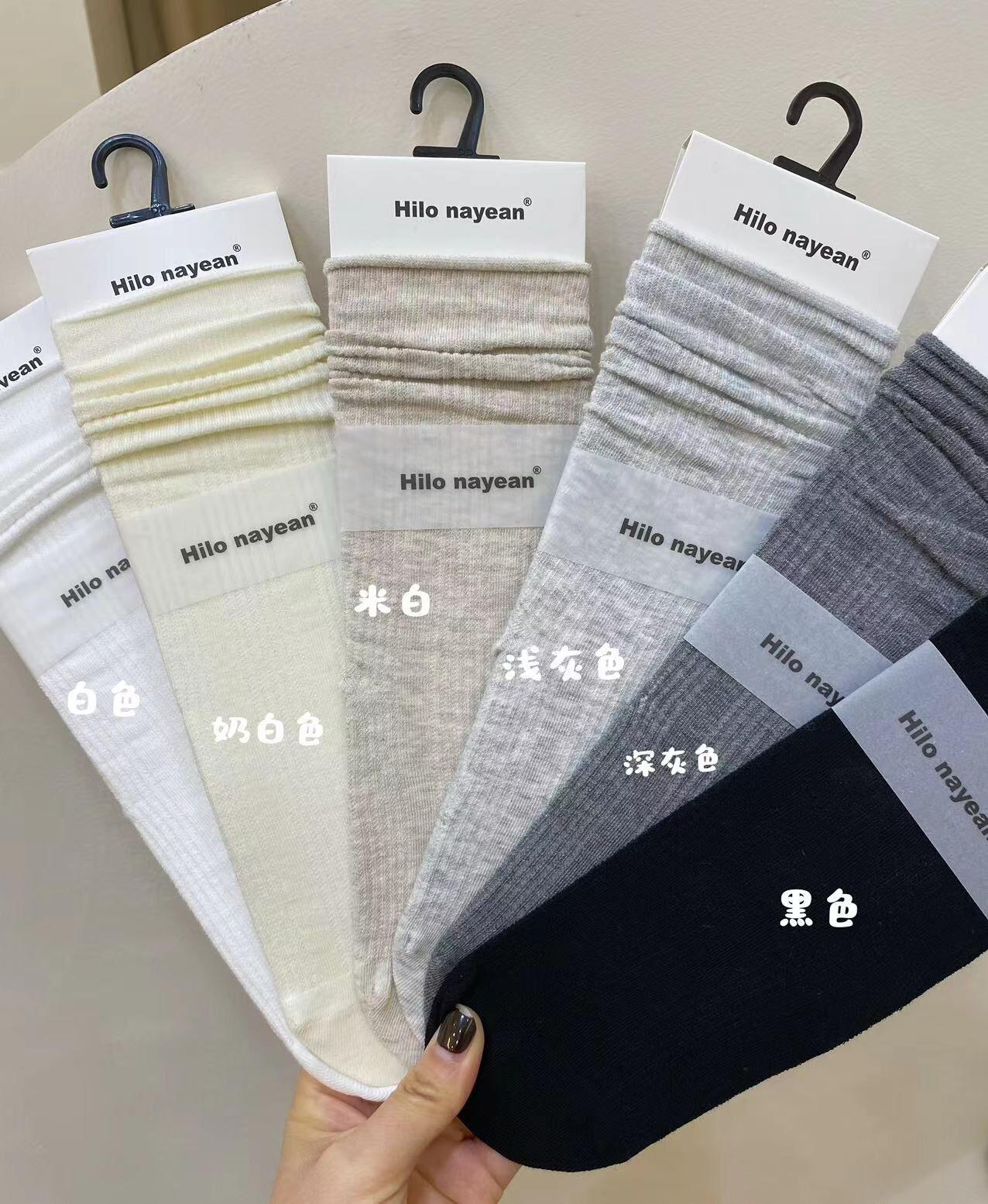 

2024 Nanye Boneless Hollow Mesh Cotton Mid-Leg High Ji Gray Tie Pile Socks Girl One size fits all світло-сірого кольору