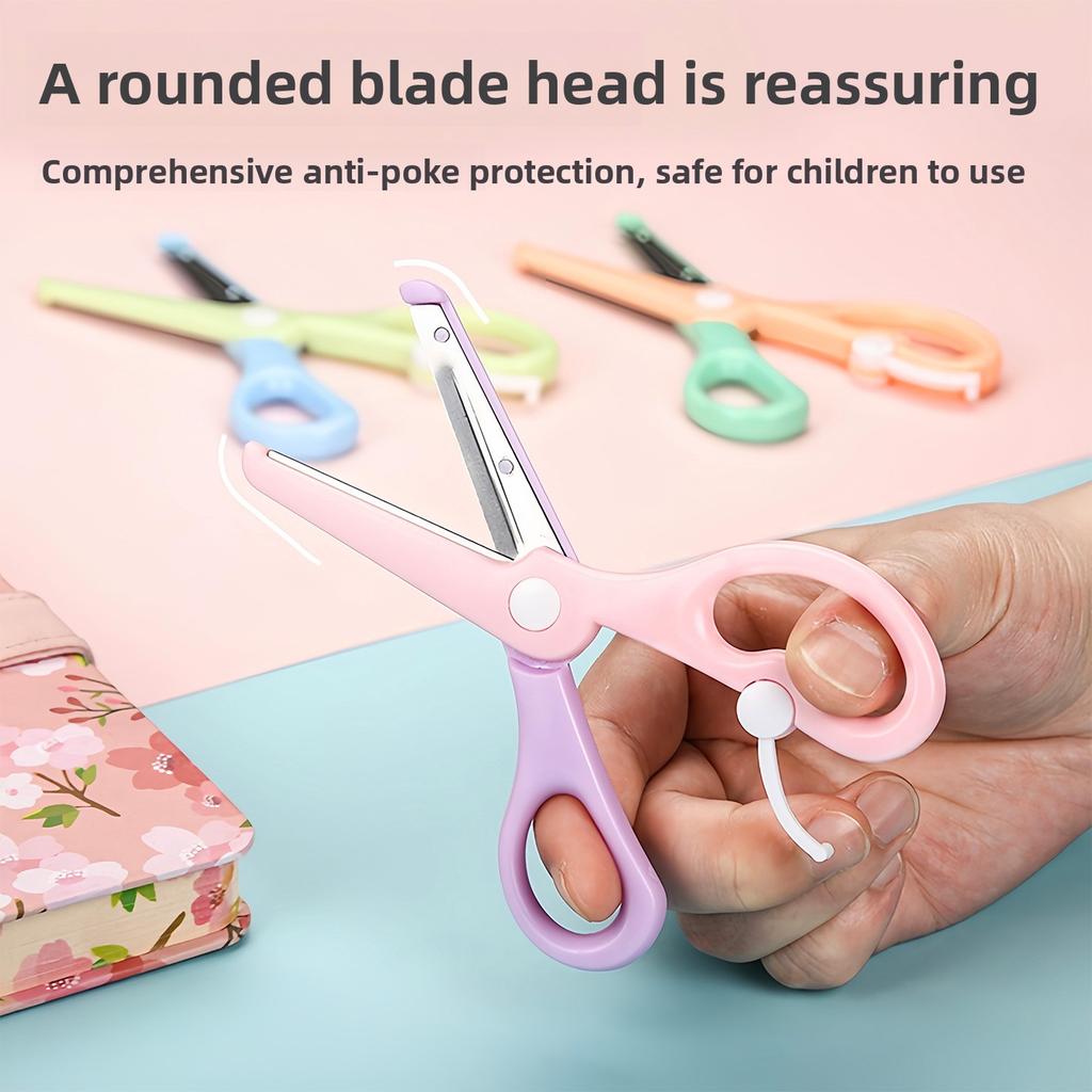 Kinderscheren mit elastischen abgerundeten Spitzen zur Vermeidung von Fingerquetschungen