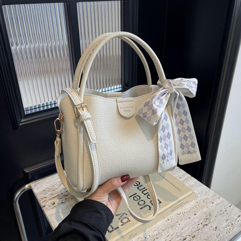 High-end small bag women's new trendy and versatile messenger bag casual bow lychee pattern portable mother bucket bag